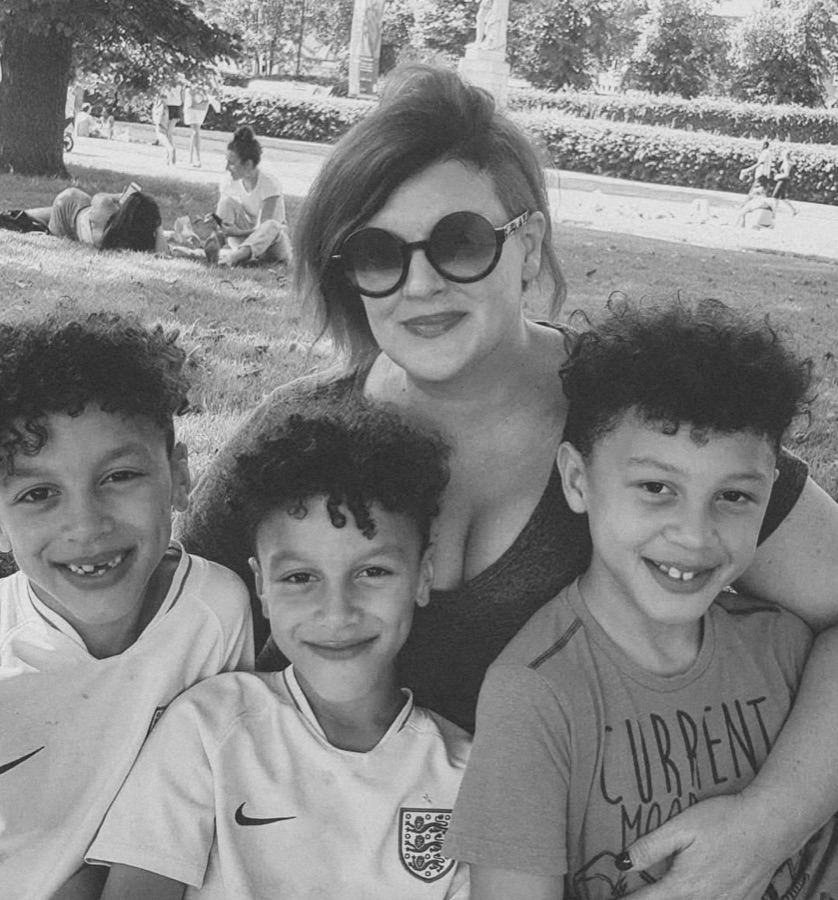 Cameron in the park with three of her boys